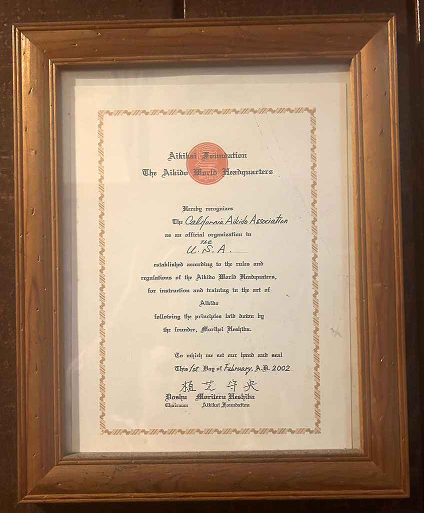 Certificate of recognition of the California Aikido Association (CAA) by the Aikido Wolrd Headquarters signed by Ueshiba Moriteru Doshu on February 1, 2002.
